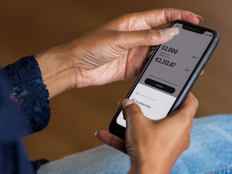 An application in use on a phone held in one hand
