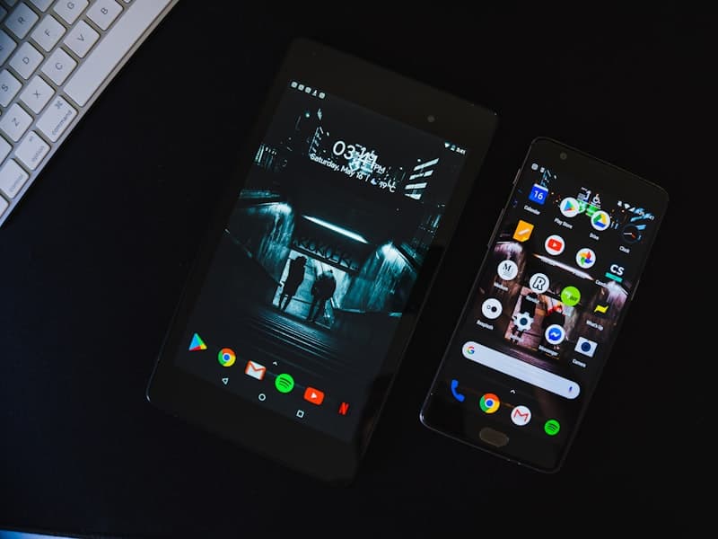A bench of test handsets running the same application